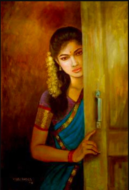 A girl dressed in a saree, has jasmine flowers in her hair, she stares from behind the door which partially hides her.